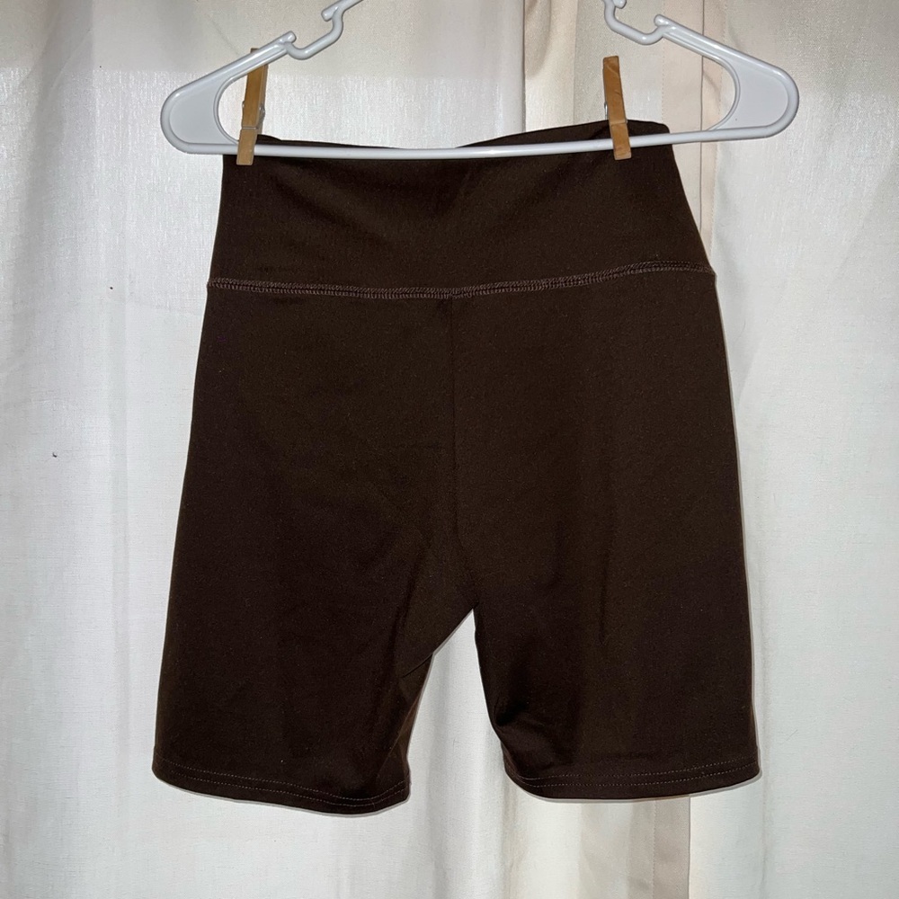 Size medium, color brown, bike shorts from Garage.